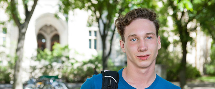 A college boy smiling