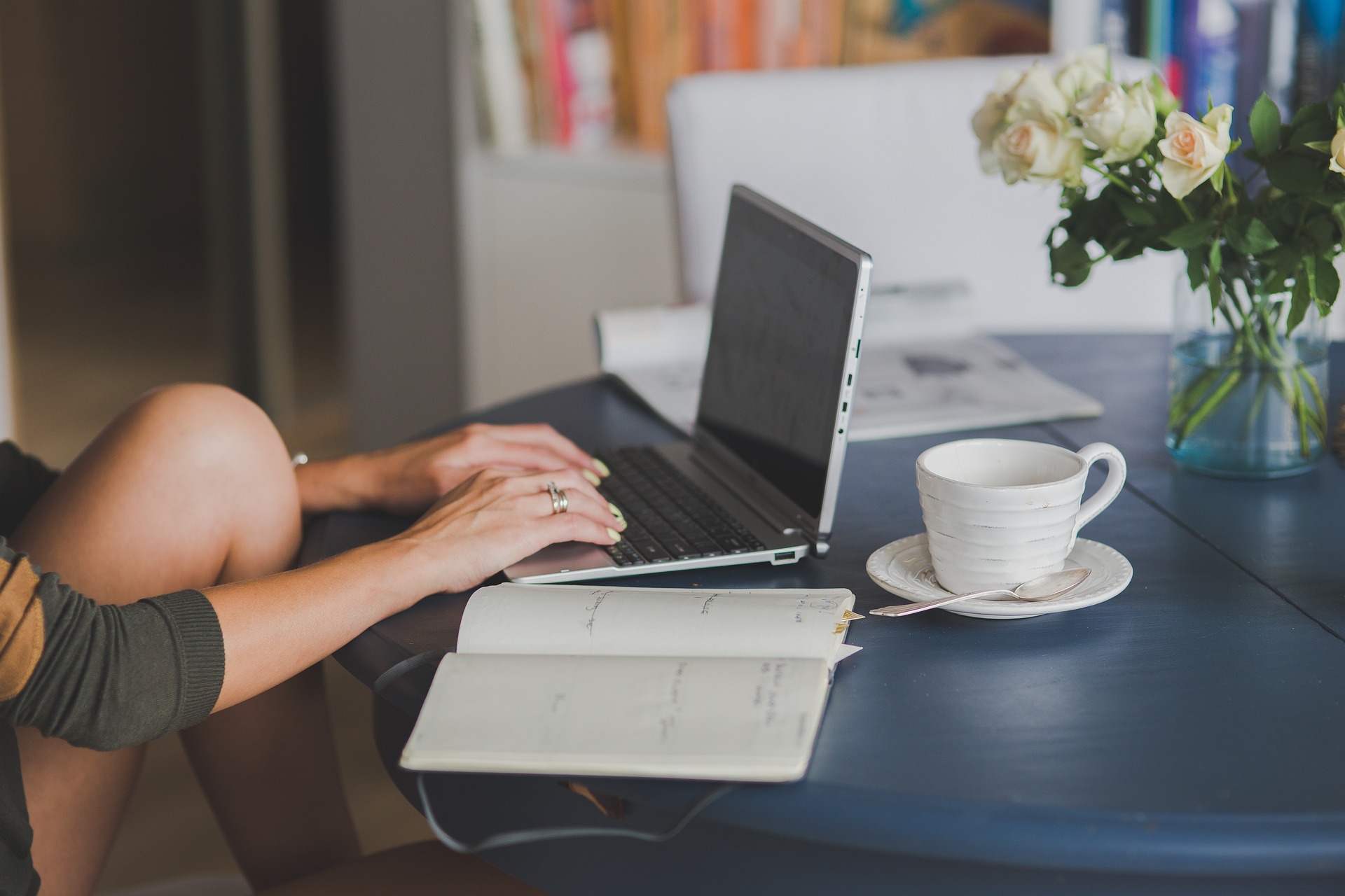 A woman working on laptop