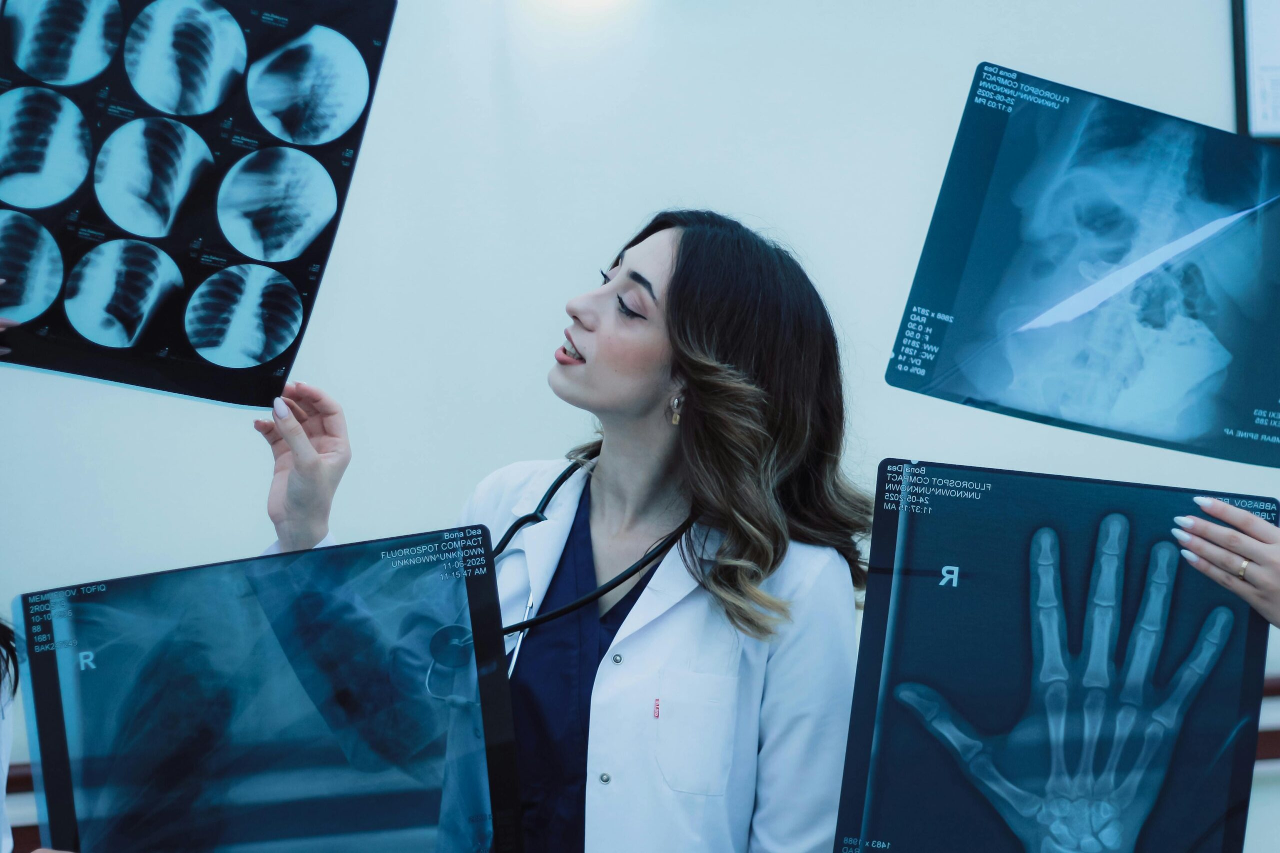 Medical Professional Analyzing X-Ray Films